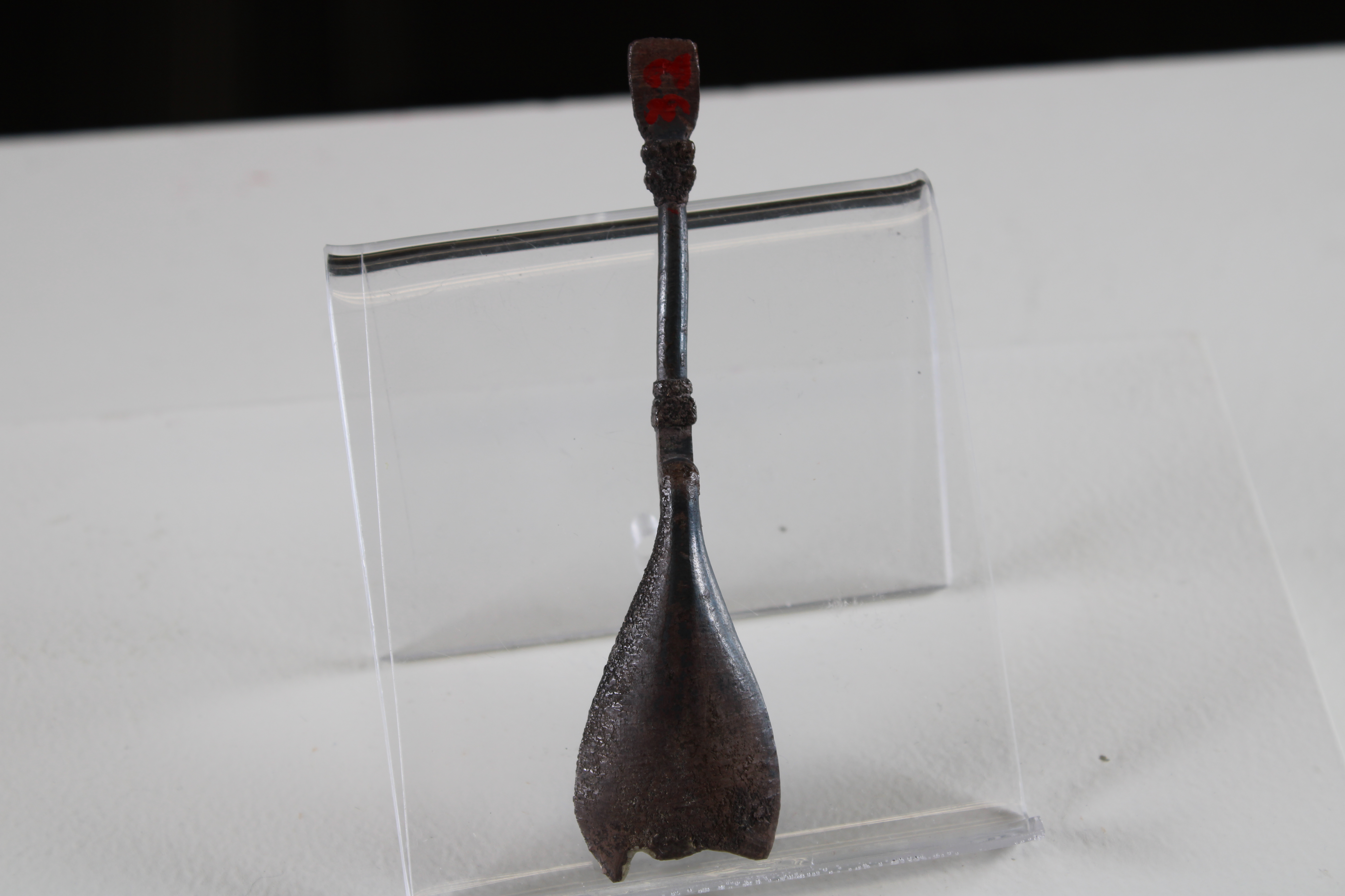 A small metal spoon from the back