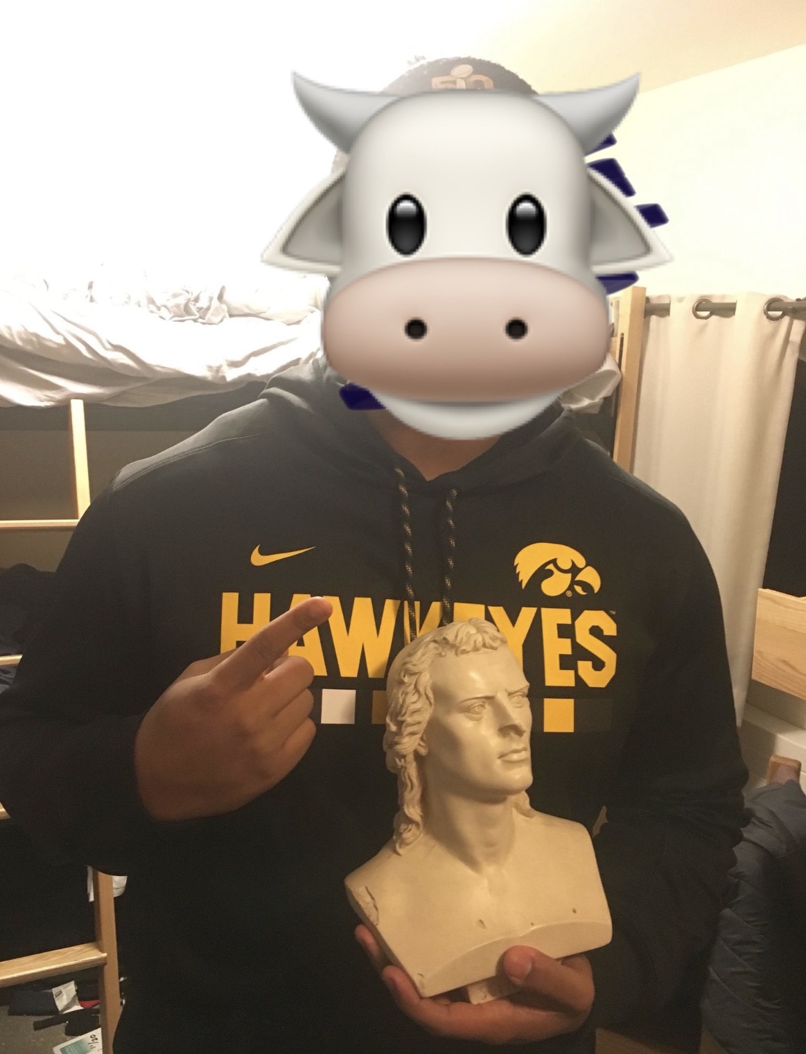 Student posing with Schiller bust
